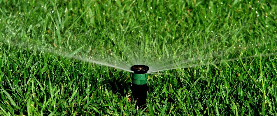 Sprinkler irrigation system spraying water on a property in Clarkstown, NY.